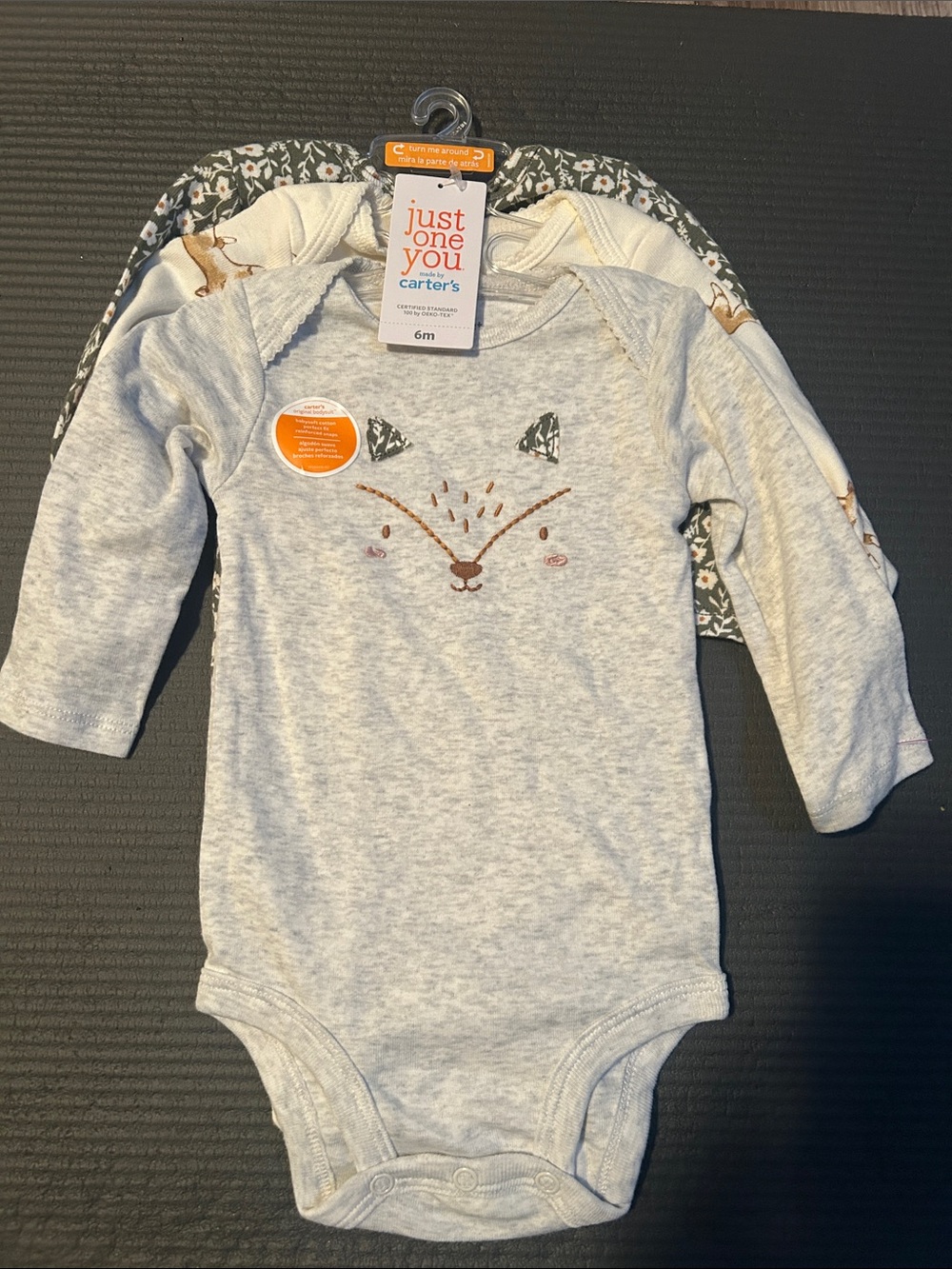 Carter's lot of three long sleeve one piece suits
